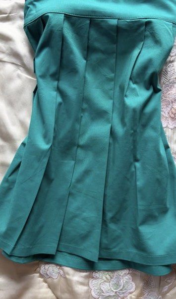 Onlyone Floral Emerald Halter Top XS-S (Category: Sleeveless) located in Manila. Submitted by clairebear09 (Listing ID 1462809873, Image 3). Description: - Emerald green halter dress - Features a floral print top - Ties at the neck for adjustable fit - Pleated skirt detail - Fits XS to S (bust up to 32cm) - Ideal for beach days or casual outings - RFS: Decluttering - got from ig shop TAGS: Fairy, Tropical, Sunset, Cami, Fairycore, Teal, Barbie, W