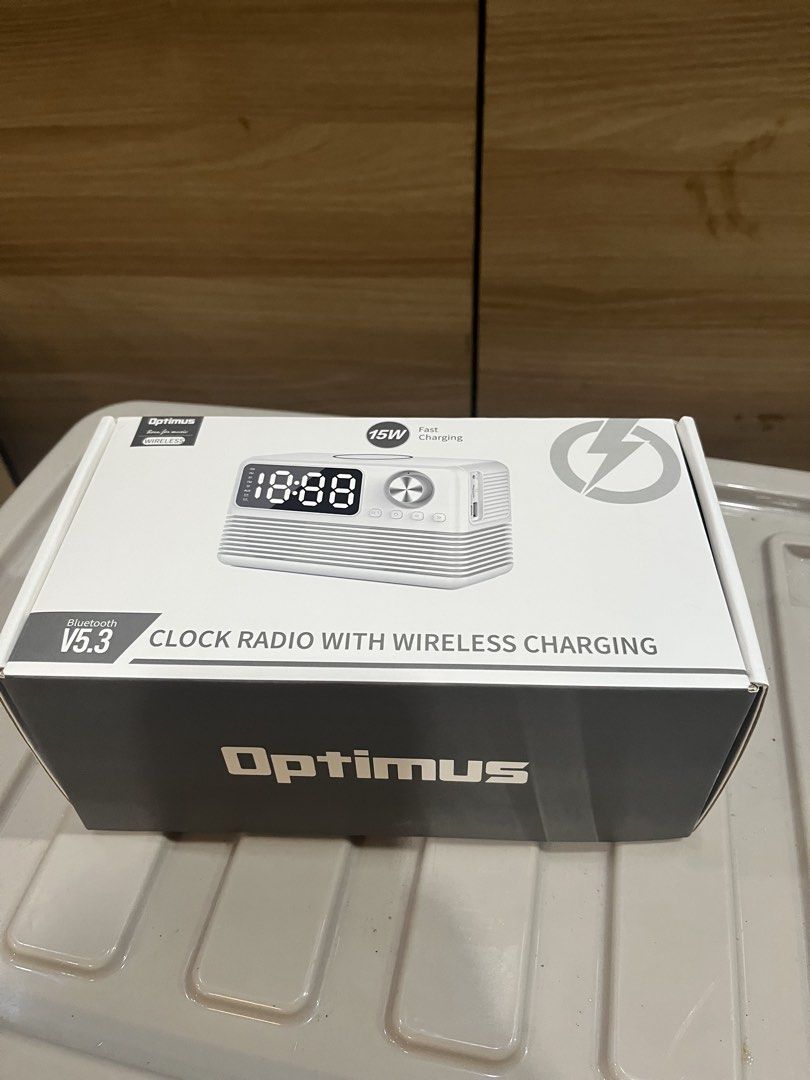 Optimus Clock Radio with Wireless Charging Bluetooth V5.3 (Category: Clocks) located in Manila. Submitted by jericho_chan (Listing ID 1462726100, Image 2). Description: - Optimus Clock Radio with Wireless Charging - Bluetooth V5.3 for seamless audio streaming - Mirror screen display for a modern look - Dual alarm clock functions - Supports SD card playback - Aux-in for wired connections - Built-in FM Radio - Type-C charging port - Fast charging u