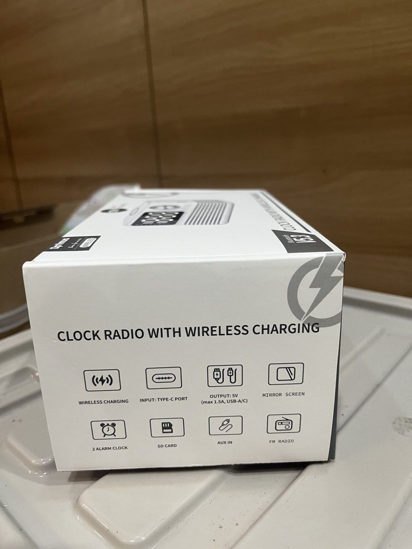 Optimus Clock Radio with Wireless Charging Bluetooth V5.3 (Category: Clocks) located in Manila. Submitted by jericho_chan (Listing ID 1462726100, Image 3). Description: - Optimus Clock Radio with Wireless Charging - Bluetooth V5.3 for seamless audio streaming - Mirror screen display for a modern look - Dual alarm clock functions - Supports SD card playback - Aux-in for wired connections - Built-in FM Radio - Type-C charging port - Fast charging u
