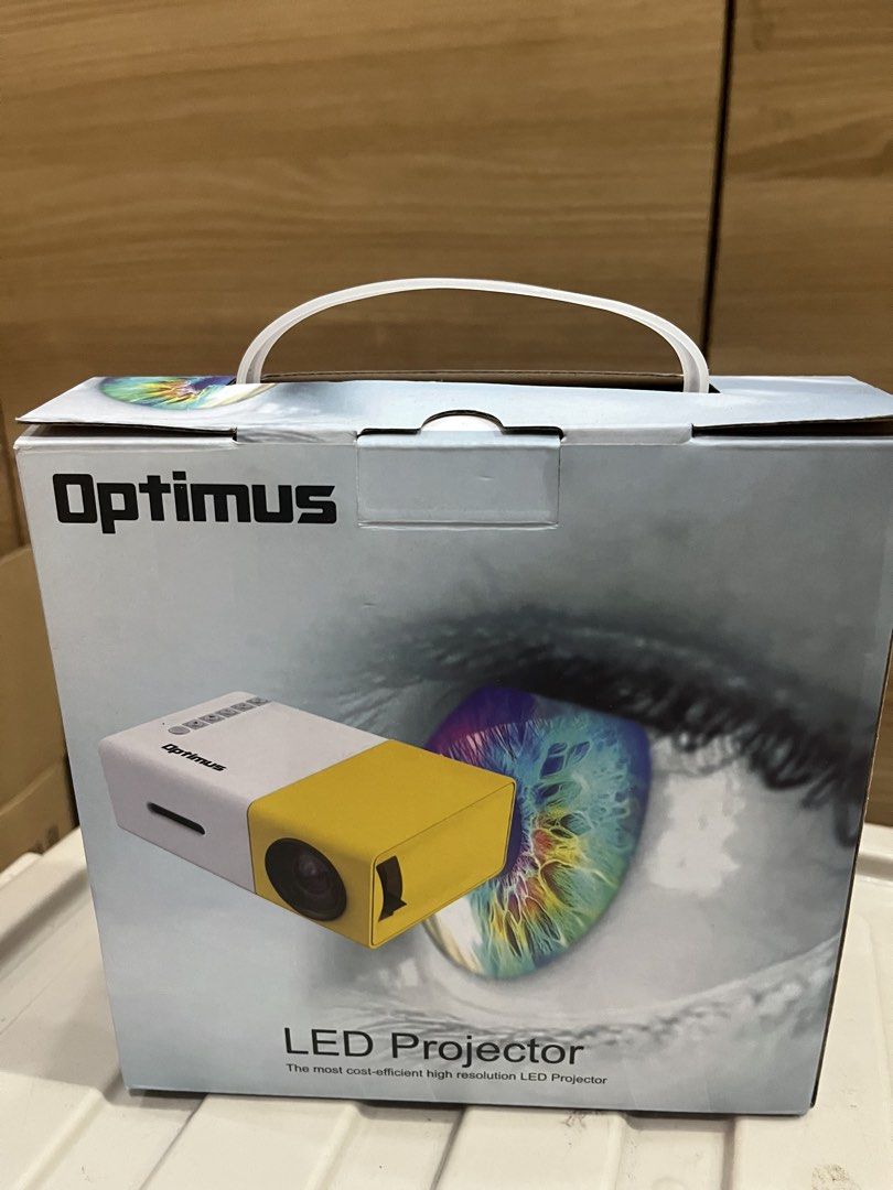 Optimus LED Projector - Most Cost-Efficient High Resolution (Category: Projectors) located in Manila. Submitted by jericho_chan (Listing ID 1462725889, Image 2). Description: - Optimus LED Projector - High Resolution - Very Cost-Efficient - Perfect for Home Entertainment - Compact and Portable Design - Easy to Set Up and Use - Bring the Cinema Experience Home.