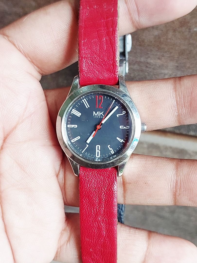 Orient MK London Watch - Red Leather Strap (Category: Women's Watches) located in Batangas. Submitted by vintageanddainty (Listing ID 1462695987, Image 1). Description: - MK London Watch - Sleek black dial - Vibrant red leather strap (adjustable) - Water resistant up to 5 bar - Durable stainless steel casing - Reliable Japan movement - Ideal for everyday wear.