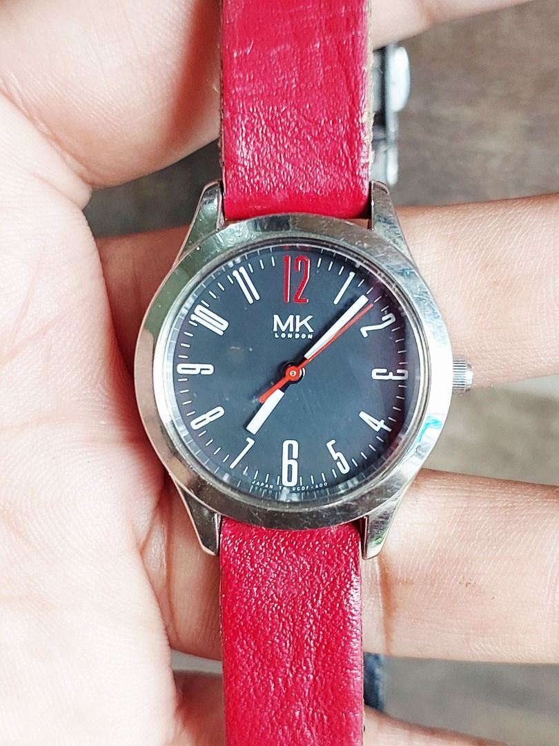 Orient MK London Watch - Red Leather Strap (Category: Women's Watches) located in Batangas. Submitted by vintageanddainty (Listing ID 1462695987, Image 2). Description: - MK London Watch - Sleek black dial - Vibrant red leather strap (adjustable) - Water resistant up to 5 bar - Durable stainless steel casing - Reliable Japan movement - Ideal for everyday wear.