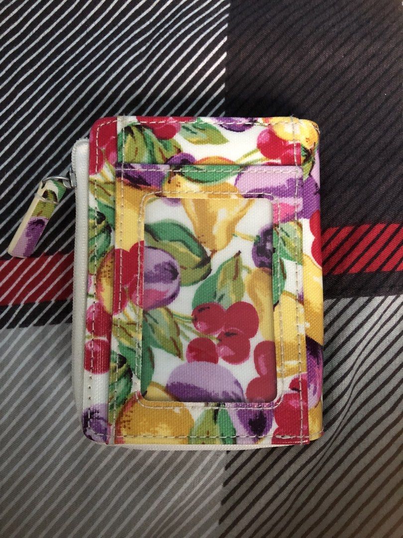 Original Cath Kidston Wallet (Category: Wallets & Card holders) located in Las Pinas. Submitted by kaiiiiii_01 (Listing ID 1462733555, Image 2). Description: - has 6 card slots - has bills slot - has ID / transpo card slot - has coins slot RFS: Decluttering Price negotiable.