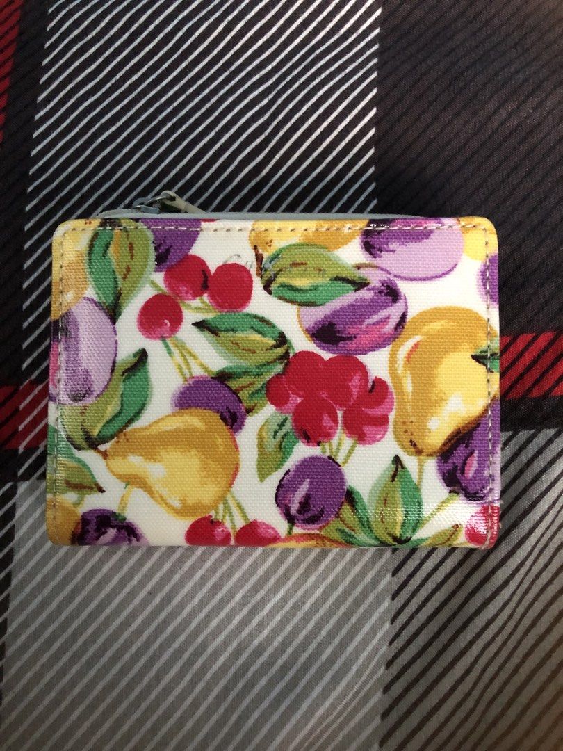 Original Cath Kidston Wallet (Category: Wallets & Card holders) located in Las Pinas. Submitted by kaiiiiii_01 (Listing ID 1462733555, Image 1). Description: - has 6 card slots - has bills slot - has ID / transpo card slot - has coins slot RFS: Decluttering Price negotiable.