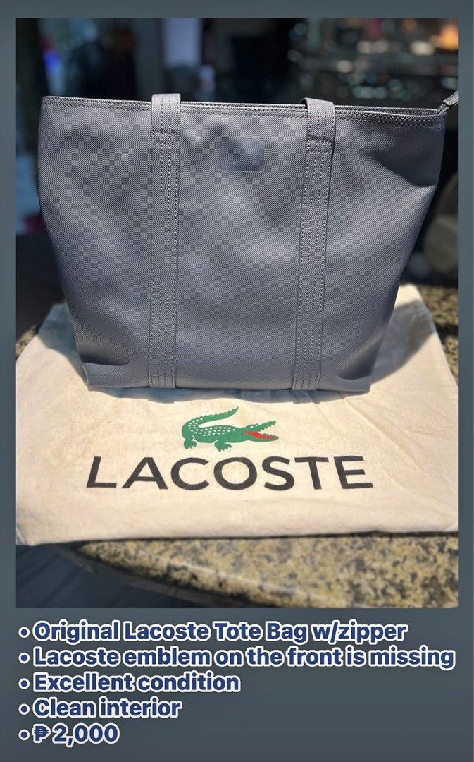 Original Lacoste Tote Bag w/ Zipper (Category: Tote Bags) located in Manila. Submitted by kathlv (Listing ID 1462876196, Image 1). Description: - Original Lacoste tote bag - Zipper closure for security - Lacoste emblem on front is missing - Interior is clean - Excellent overall condition - Ideal for everyday use.