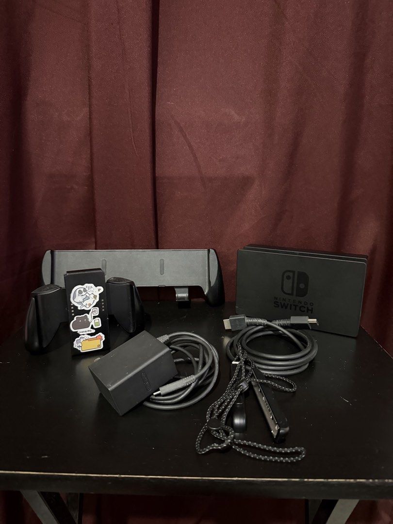 Original Nintendo Switch Accessories (Category: Controllers) located in Caloocan City. Submitted by rohllee (Listing ID 1462712275, Image 3). Description: Nintendo Switch Accessories Original Charger - SOLD Original Dock - SOLD Original HDMI - SOLD Original Controller Grip - 400 Nintendo Switch OLED Grip - 400 Original Wrist Straps - 149 Take all for 800 Location: Guadalupe, Makati.