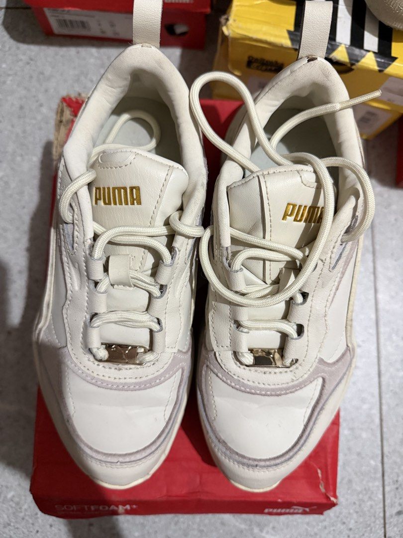 Original Puma Cream/Beige Chunky Sneakers (Category: Sneakers) located in Caloocan City. Submitted by rohllee (Listing ID 1462714556, Image 2). Description: - Cream and beige Puma sneakers - Chunky sole design - Lace-up closure with gold accent laces - Comfortable for everyday wear - Comes with original box Original Puma Sneakers Size: US 6; 22.5cm Location: Guadalupe, Makati.
