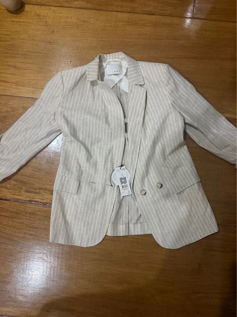 OUI Striped Linen Blend Blazer (Category: Coats, Jackets and Outerwear) located in Manila. Submitted by poppymart0525 (Listing ID 1462688206, Image 1). Description: - OUI Blazer, bought for 180 euros ~13k pesos - Pinstripe pattern - Natural beige and white color - Button closure - Ideal for layering - Size: 38.