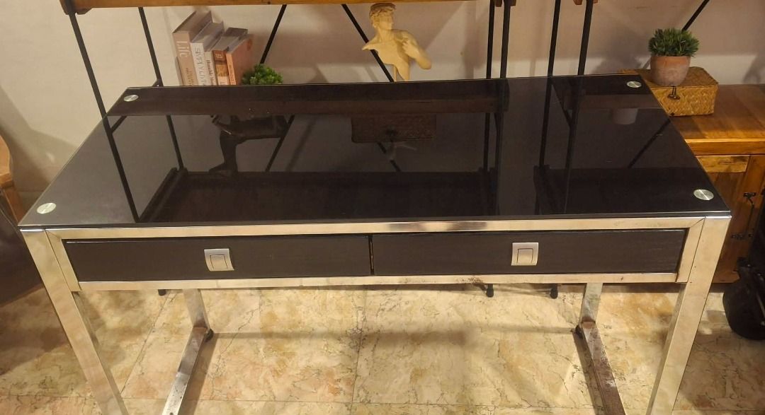 Our Home Working Table with Black Glass Top (Category: Tables & Sets) located in Quezon City. Submitted by nika_ballesteros (Listing ID 1462721503, Image 2). Description: Working table Color: Black Glass top Brand/Store: Our Home Original Price: Php 17,950 Selling Price: Php 3,500 ONLY Condition: With visible rust marks Location: UP Village Diliman Quezon City.