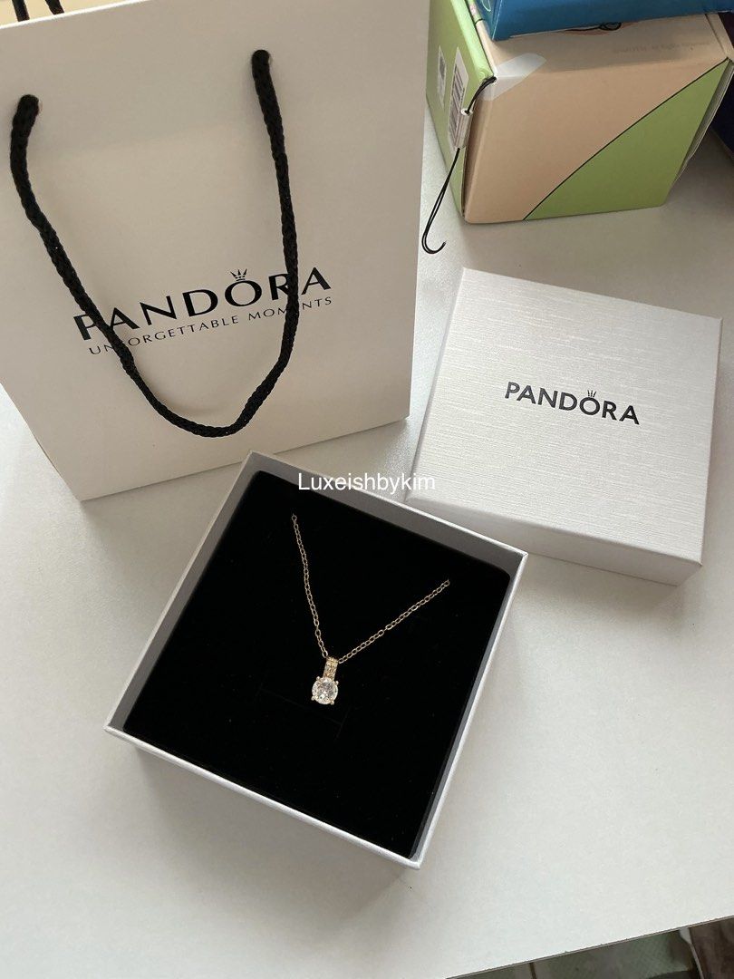Pandora Gold necklace (Category: Body Jewelry) located in Pilar. Submitted by kimberlynicoledg (Listing ID 1462702632, Image 1). Description: ONHAND | visit our IG @luxeishbykim non tarnish & hypoallergenic with free box and paper bag.