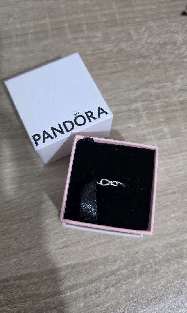 Pandora Infinity Knot Ring (Category: Rings) located in Dasmarinas. Submitted by 32mimimi (Listing ID 1462850278, Image 1). Description: size 4 comes with box.