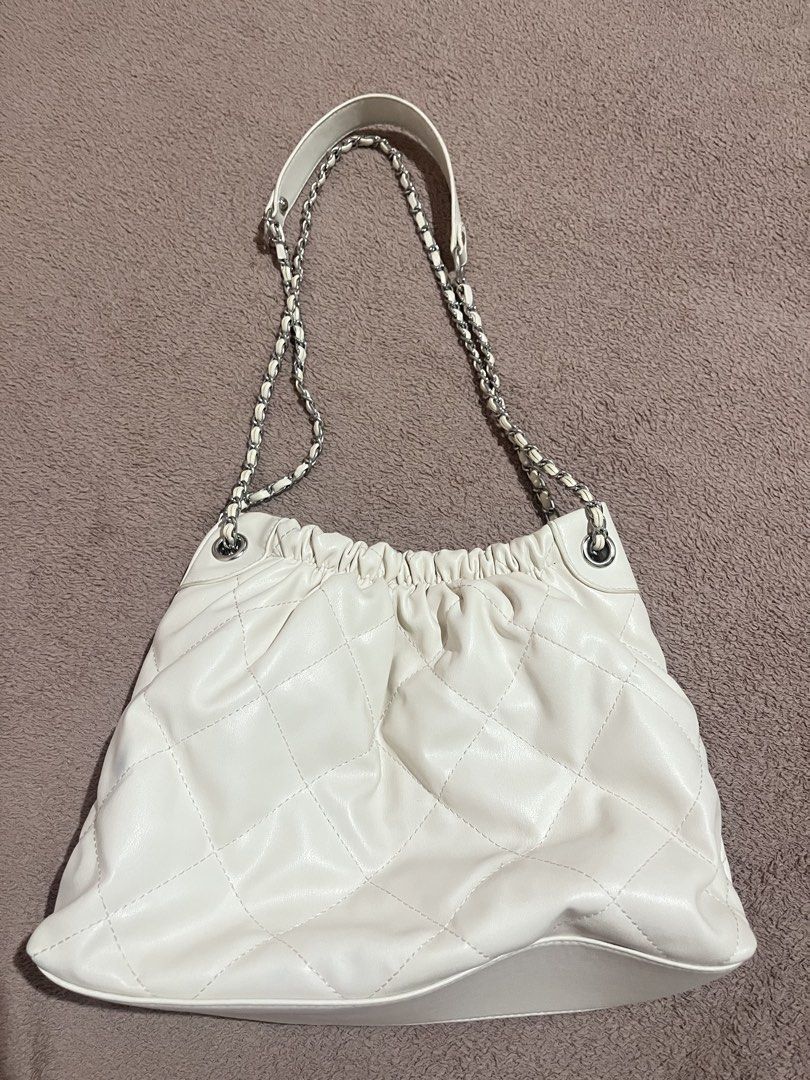 Parisian Quilted Chain Bag (Category: Shoulder Bags) located in Baguio. Submitted by mikachuuu368 (Listing ID 1462826299, Image 2). Description: Parisian Quilted ChainBag • Color: off white • Adjustable chain— can be kili bag or cross body • Lightly used; no issues! Can do LP!! .