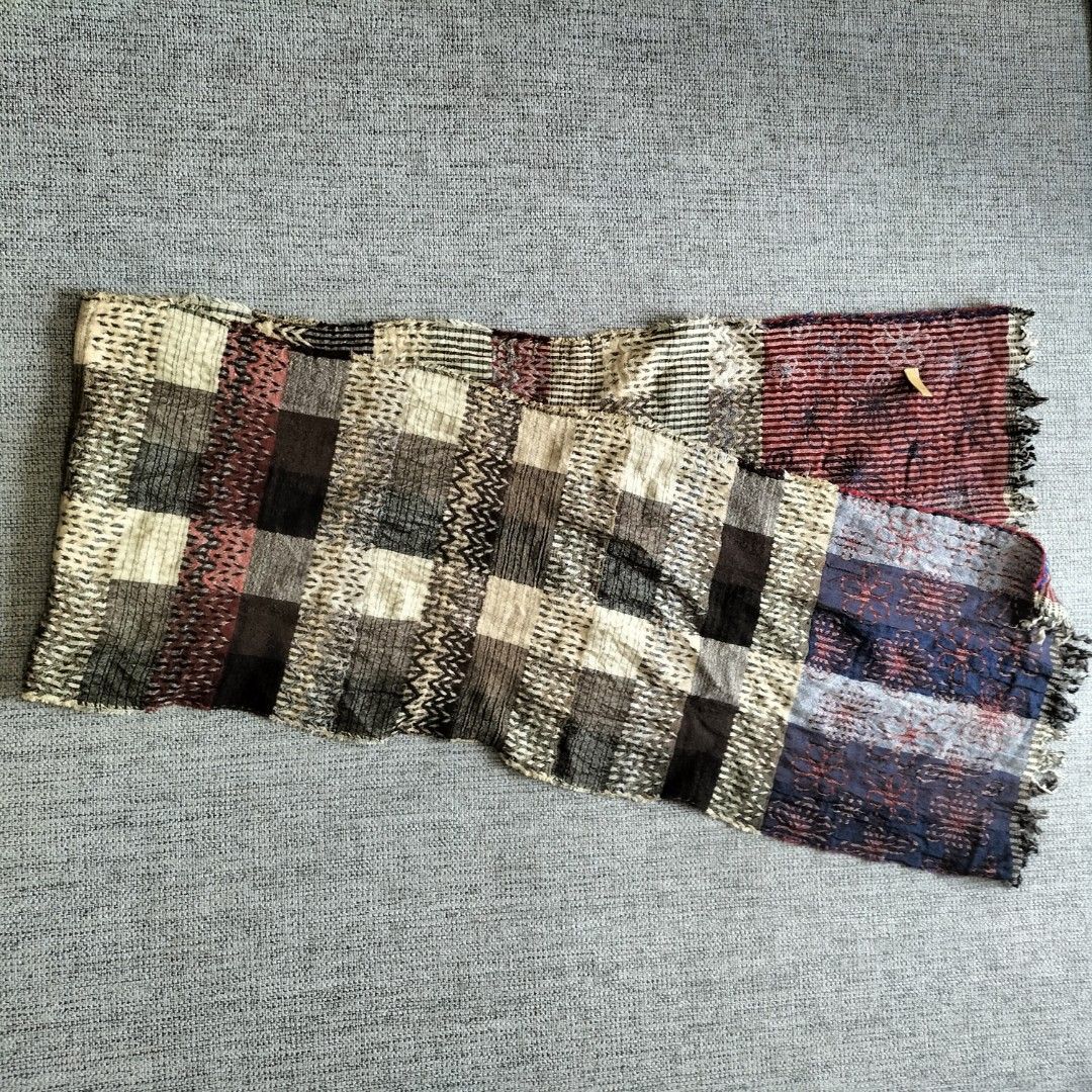 Patchwork Scarf with Fringed Ends (Category: Scarves) located in Taytay. Submitted by calmtree-6248 (Listing ID 1462807435, Image 2). Description: - Unique patchwork design - Mix of plaid and abstract patterns - Earthy tones, deep reds, and blues - Fringed edges for a bohemian look - Lightweight material, perfect for layering.