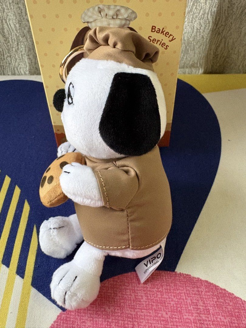 VIPO x Peanuts Snoopy Baking Series (Category: Plushies & Soft Toys) located in Manila. Submitted by champsey (Listing ID 1462772198, Image 3). Description: - VIPO x Peanuts Snoopy Plush Pendant : Bakery Series. - Features Snoopy Olaf dressed as a baker, holding a cookie. - Comes with its original box (opened box & foil) - Height about 16cm - Perfect for Peanuts fans and collectors. - Location: Manila - PM if interested. .