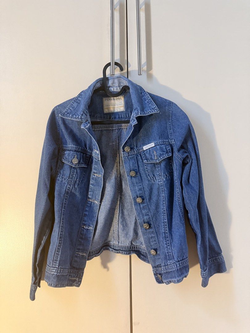 Penshoppe Blue Denim Jacket (Category: Coats, Jackets and Outerwear) located in Manila. Submitted by audreyyyy9 (Listing ID 1462793000, Image 1). Description: - Classic blue denim jacket from Penshoppe - Button-up front - Two chest pockets - Long sleeves with button cuffs - Ideal for layering over any outfit - Versatile wardrobe staple.
