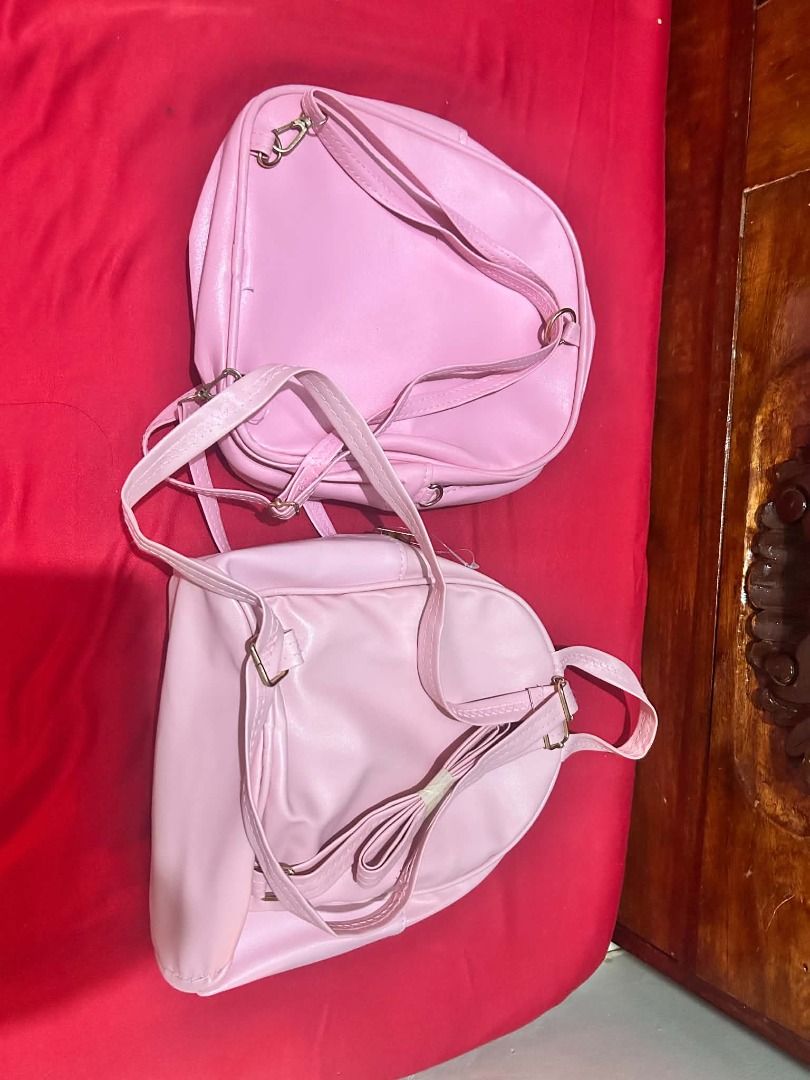 Pink Backpack Set (Category: Backpacks) located in Valenzuela. Submitted by sv072724 (Listing ID 1462741177, Image 2). Description: - Set of two pink backpacks - One backpack is slightly larger than the other - Adjustable straps for comfortable wear - Elegant gold hardware accents 1 backpack and Jelly Bag Brandnew 1 backpack used only inside the house .