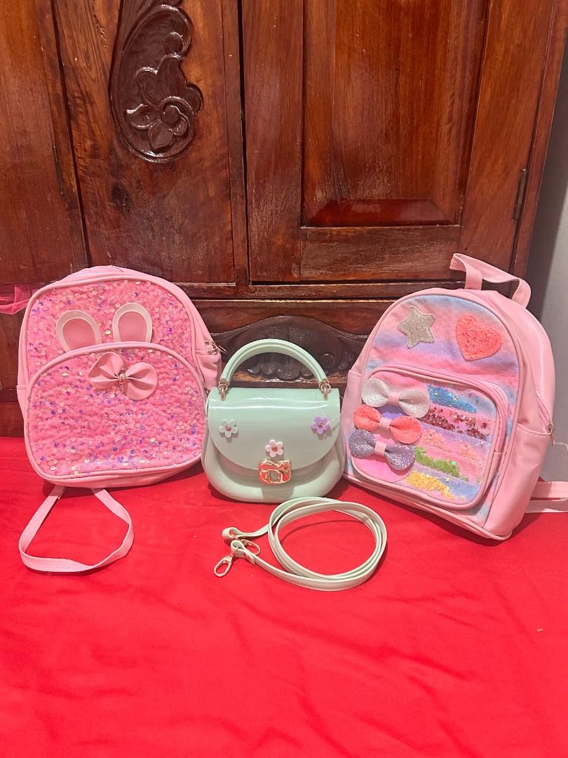 Pink Backpack Set (Category: Backpacks) located in Valenzuela. Submitted by sv072724 (Listing ID 1462741177, Image 1). Description: - Set of two pink backpacks - One backpack is slightly larger than the other - Adjustable straps for comfortable wear - Elegant gold hardware accents 1 backpack and Jelly Bag Brandnew 1 backpack used only inside the house .