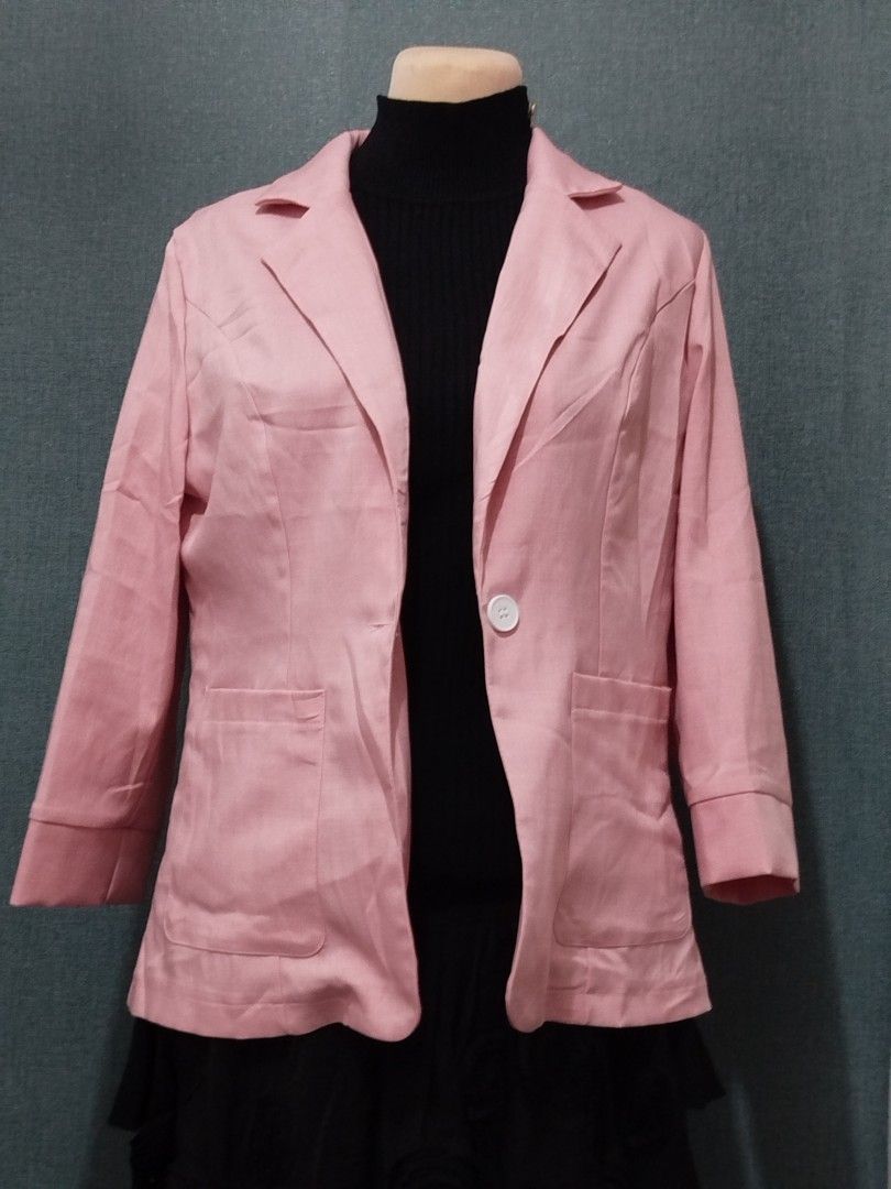 Pink Blazer Jacket (Category: Coats, Jackets and Outerwear) located in Quezon City. Submitted by plus4lessshop (Listing ID 1462718337, Image 1). Description: - Light pink blazer - Two front pockets - Single button closure - 3/4 length sleeves - Versatile for casual or semi-formal wear - Great for layering.