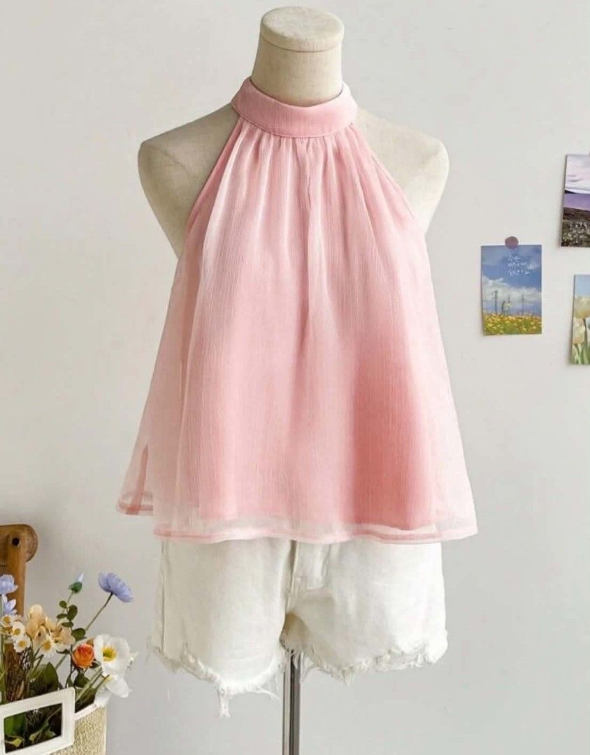 Pink Halter Top with Back Bow Detail (Category: Sleeveless) located in Paranaque City. Submitted by lizzyscloset01 (Listing ID 1462795379, Image 1). Description: - Cute pink halter neck top - Lightweight fabric with a nice drape - Features a big bow tie at the back - Ideal for casual outings or beach trips - Easily pairs with shorts or skirts - Enjoy the flowy fit.