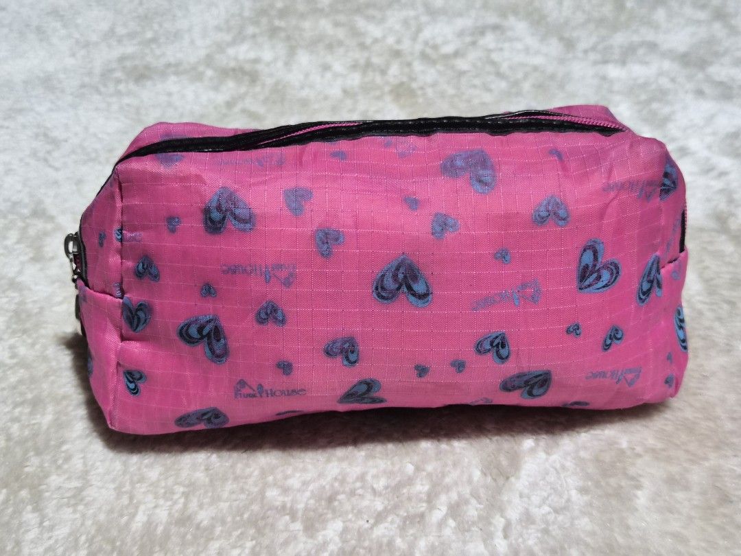 Pink Heart Pouch Bag (Category: Purses & Pouches) located in Mandaue City. Submitted by chuchi152615 (Listing ID 1462711843, Image 1). Description: - Adorable pink pouch with a fun all-over heart pattern. - Secure zipper closure to keep your belongings safe. - Ideal for storing makeup, stationery, or other small essentials. - Compact and portable for easy carrying. - Made from durable and wipeable material. - Versatile for both travel and everyda