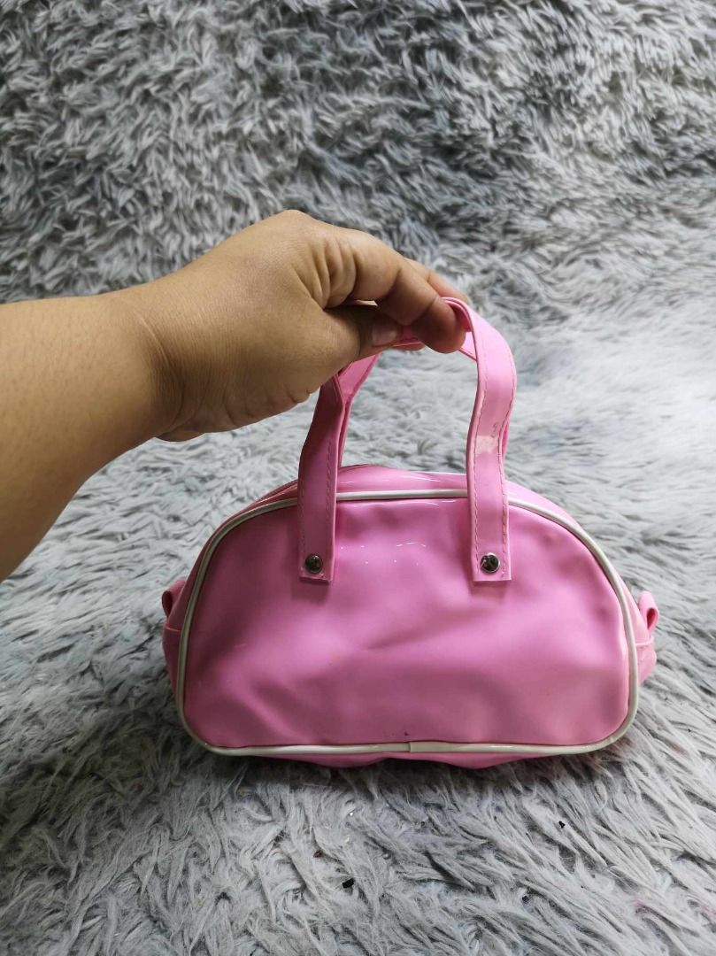 Pink Mini Duffel Style Mini Hand Bag (Category: Purses & Pouches) located in Santa Cruz. Submitted by jmy_surplus.2 (Listing ID 1462705506, Image 3). Description: Size ; L - 5 W - 8.5 Color ; Pink Type ; Hand Bag Brand ; No Brand Material ; Nylon Style ; Pink Zipper Closure Dual Strap Hand Bag LR 129 JMY 5 Batch #222.