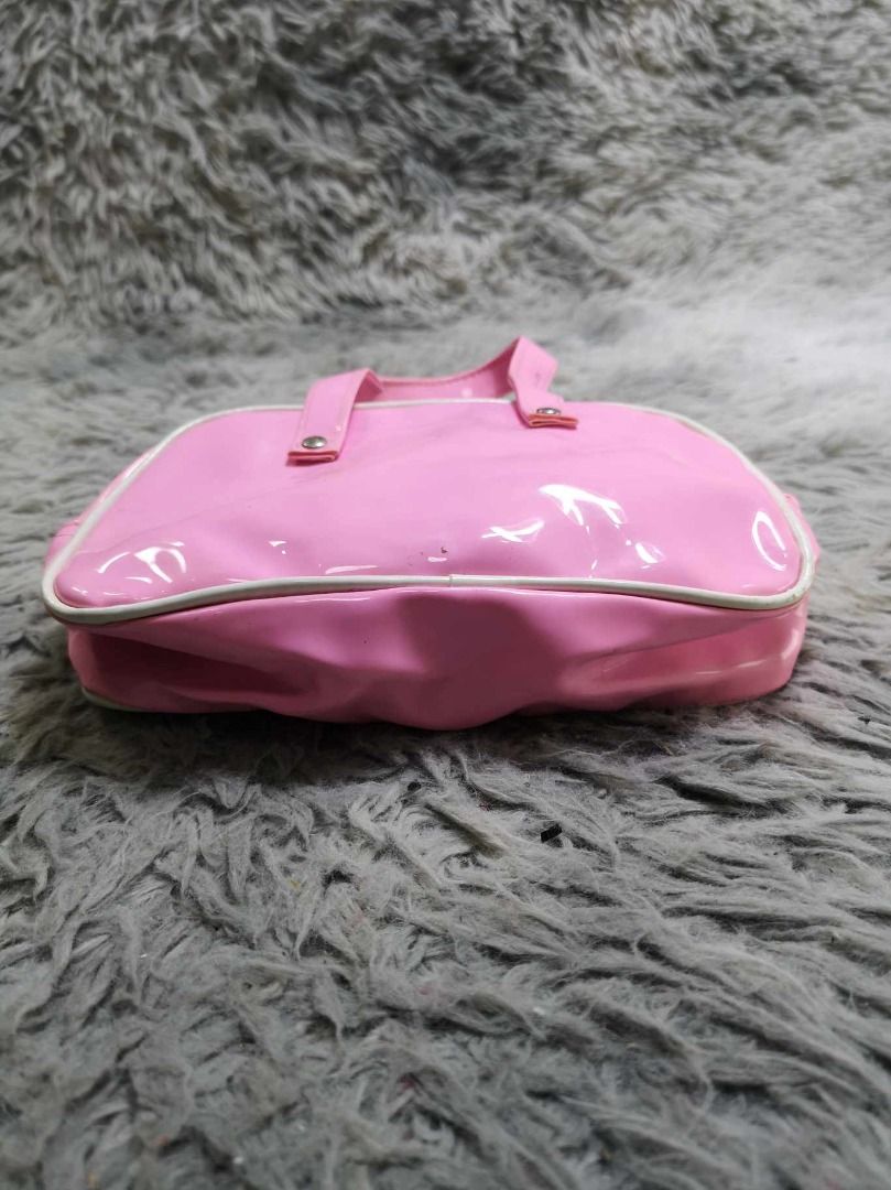 Pink Mini Duffel Style Mini Hand Bag (Category: Purses & Pouches) located in Santa Cruz. Submitted by jmy_surplus.2 (Listing ID 1462705506, Image 2). Description: Size ; L - 5 W - 8.5 Color ; Pink Type ; Hand Bag Brand ; No Brand Material ; Nylon Style ; Pink Zipper Closure Dual Strap Hand Bag LR 129 JMY 5 Batch #222.
