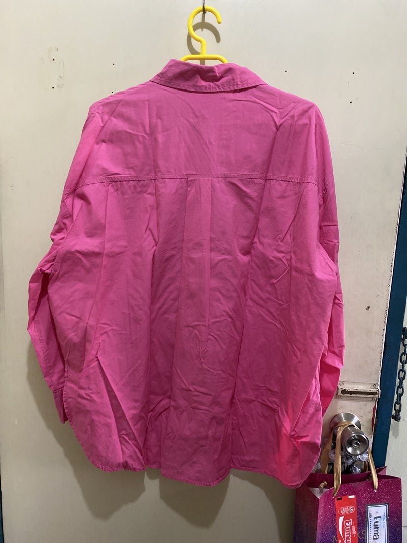 Pink Oversized Button-Up Shirt XL (Category: Shirts) located in Pasig City. Submitted by alaineeeee (Listing ID 1462766013, Image 3). Description: - Oversized pink button-up shirt - Long sleeves with button cuffs - Single chest pocket - Relaxed fit for ultimate comfort - Easy to style for any occasion - Perfect for casual wear.