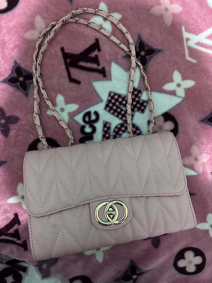 Pink Quilted Chain Bag with Double G Hardware (Category: Luxury Bags & Wallets) located in Cabuyao City. Submitted by dumbonita (Listing ID 1462835715, Image 1). Description: - Adorable pink quilted handbag - Features a stylish chain strap - Secured with a chic double G logo closure - Ideal for going out and special occasions.