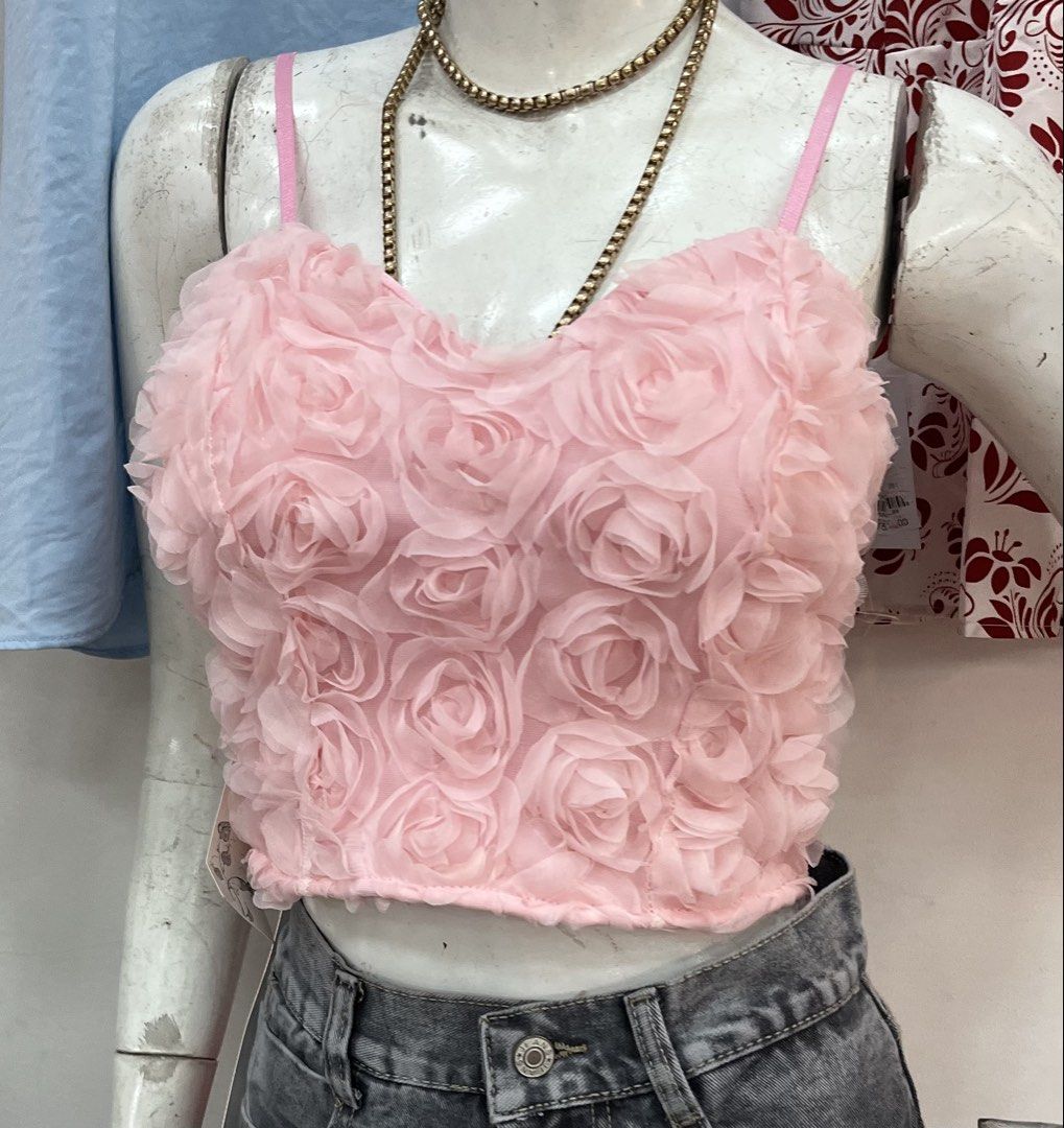 Pink Rose Applique Crop Top Spaghetti Straps (Category: Others Tops) located in Manila. Submitted by trendify.collections (Listing ID 1462800680, Image 1). Description: - Super cute pink crop top - Features 3D rose appliques all over - Delicate spaghetti straps - Pairs perfectly with high-waisted jeans or skirts - Ideal for a night out or special occasion - Truly unique and eye-catching design size small - med.