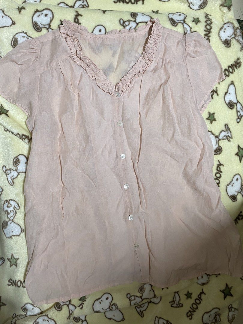 Pink Ruffled V-Neck Short Sleeve Blouse Polo (Category: Blouses) located in Manila. Submitted by faerikhae (Listing ID 1462829483, Image 1). Description: FLAW: 1 broken button only the fabric is like chiffon type a bit see through .