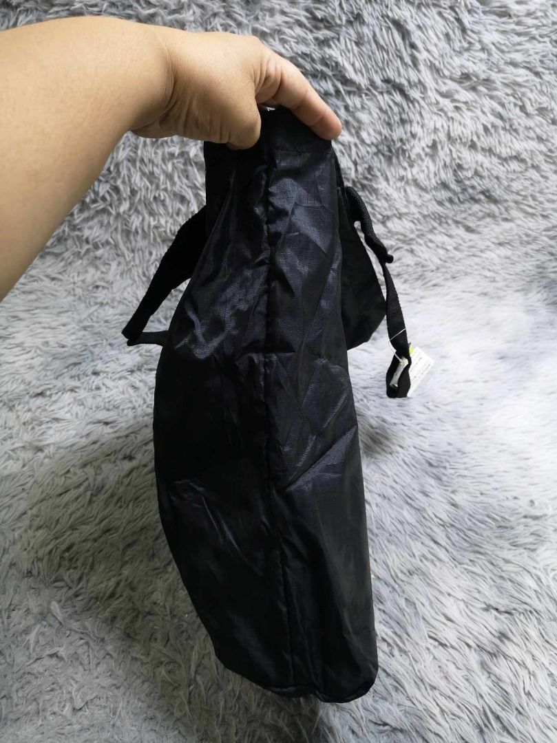 Plain Black Nylon Reusable Shopper Bag (Category: Tote Bags) located in Santa Cruz. Submitted by jmy_surplus.2 (Listing ID 1462703997, Image 2). Description: Size ; L - 18 W - 17 Color ; Black Type ; Tote Bag Brand ; No brand Material ; Nylon Style ; Black nylon Shopper Bag LR 129 JMY 5 Batch #222.