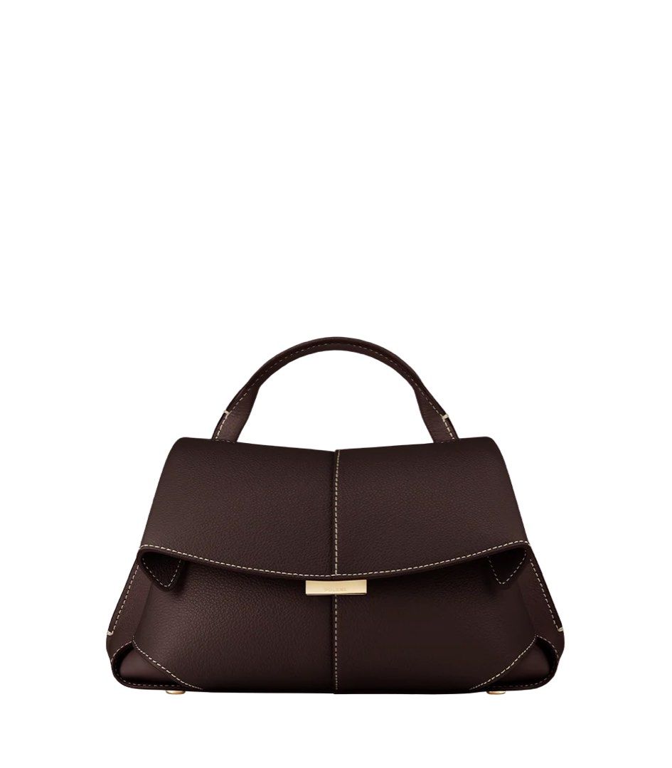 Pòlene Mimi mini (Category: Luxury Bags & Wallets) located in Makati City. Submitted by ainedejesus (Listing ID 1462684109, Image 1). Description: - Dark brown leather handbag - Structured shape - Top handle - Flap closure with gold-tone hardware - Visible stitching detail - Classic design for everyday use -Authentic bought it extra from Milan .