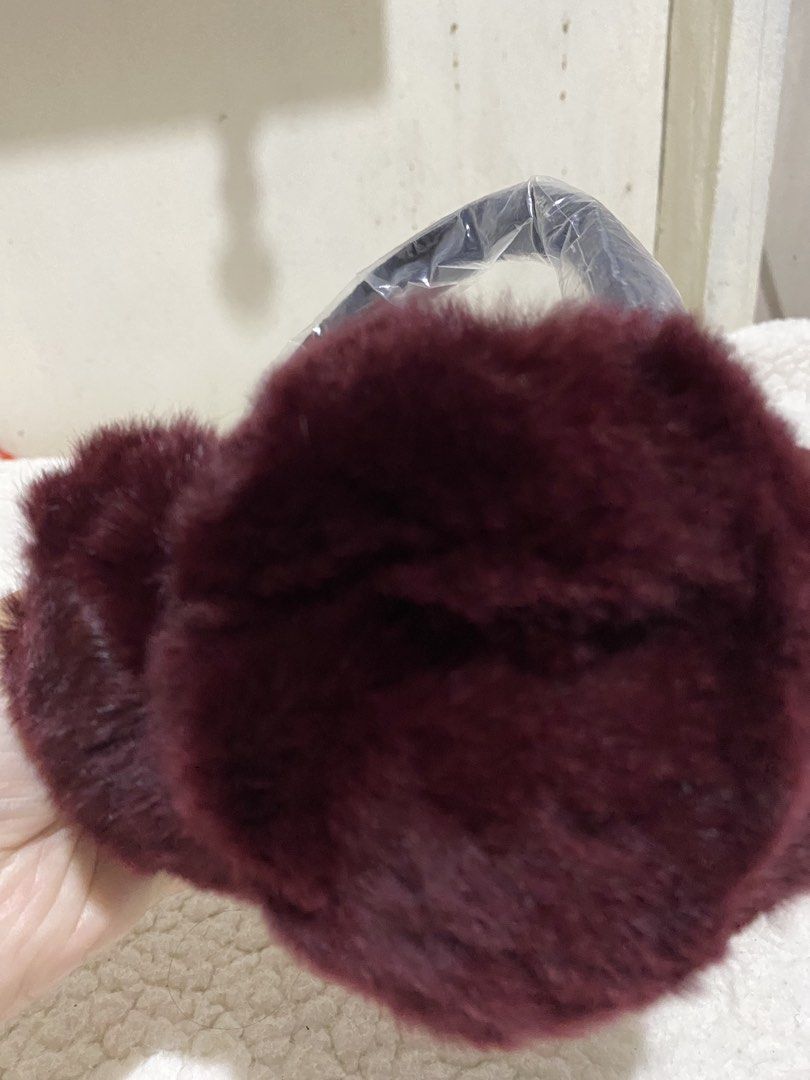 Plush Burgundy Earmuffs (Category: Other Accessories) located in Manila. Submitted by resi.diaz (Listing ID 1462877362, Image 3). Description: - Super soft and fluffy earmuffs - Cozy burgundy color - Adjustable headband for a perfect fit - Ideal for keeping ears warm on cold days - Includes original packaging.