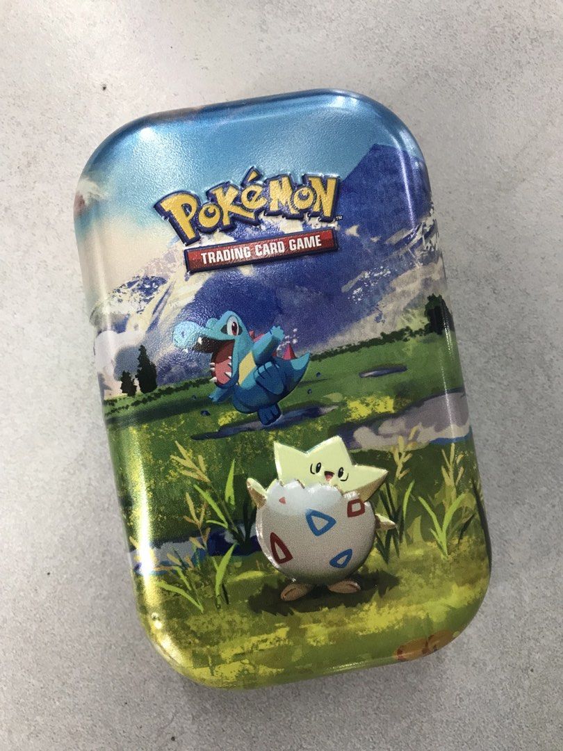Pokemon Trading Card Game Tin (Category: Card Boxes & Cases) located in Manila. Submitted by lovekittygirl (Listing ID 1462773573, Image 2). Description: - Cool Pokemon tin featuring Riolu, Togepi, and other Pokemon. - Perfect for storing your Pokemon trading cards. - No cards included. What you see is what you get - A must-have for any Pokemon fan!.