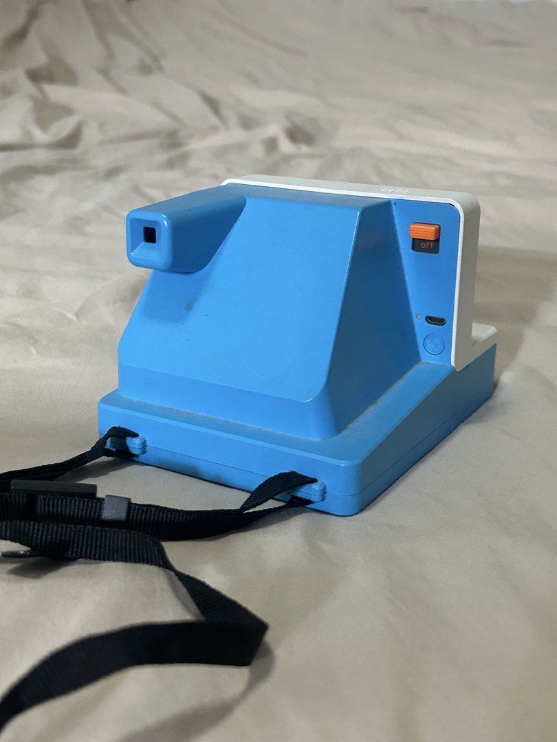 Polaroid OneStep 2 i-Type Camera Blue White (Category: Cameras) located in Manila. Submitted by eeerk (Listing ID 1462681123, Image 3). Description: - Polaroid OneStep 2 camera - Blue and white colorway - Uses i-Type instant film - Comes with a strap - Ready for your next adventure - Get creative with instant photos.