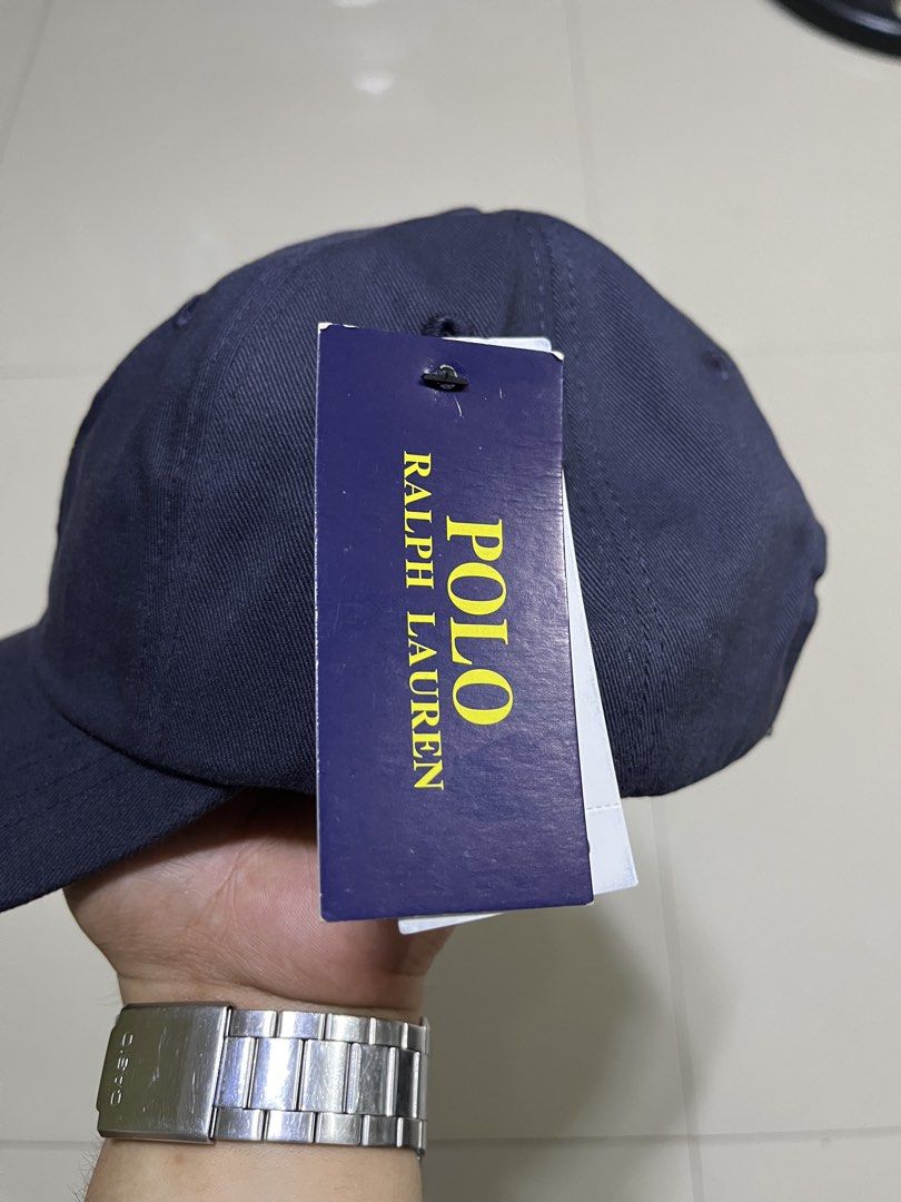 Polo Ralph Lauren Bear Cap Navy Blue (Category: Caps & Hats) located in Quezon City. Submitted by flip_da_cash (Listing ID 1462862033, Image 3). Description: - Navy blue Polo Ralph Lauren cap - Features iconic Polo Bear embroidery - Adjustable strap for a custom fit - Brand new with original tags attached - Perfect accessory to elevate any look.