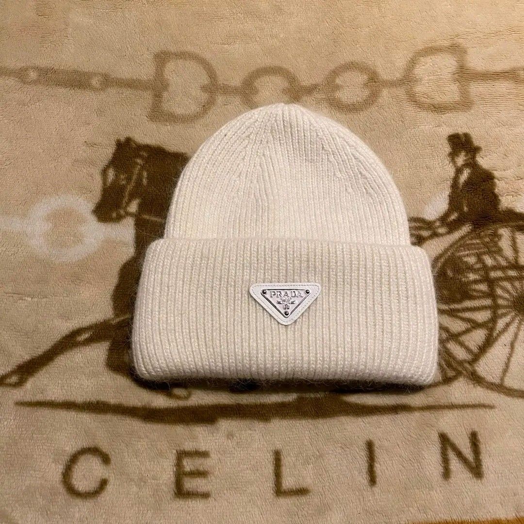 Prada Beanie (Category: Beanies) located in Manila. Submitted by bidgeyow20688 (Listing ID 1462856439, Image 1). Description: off excellent condition no issue size L goods for psg.