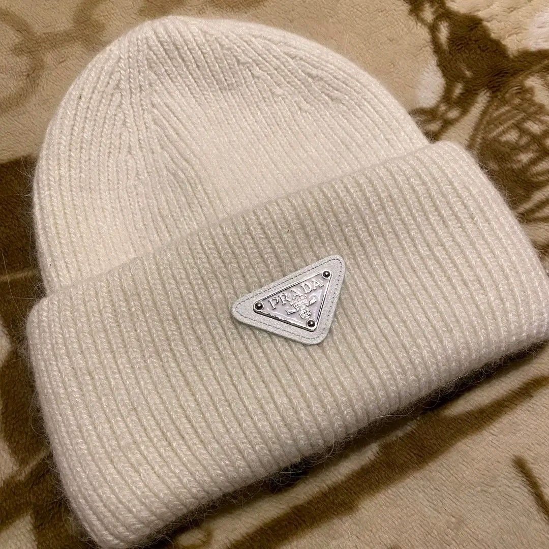 Prada Beanie (Category: Beanies) located in Manila. Submitted by bidgeyow20688 (Listing ID 1462856439, Image 2). Description: off excellent condition no issue size L goods for psg.