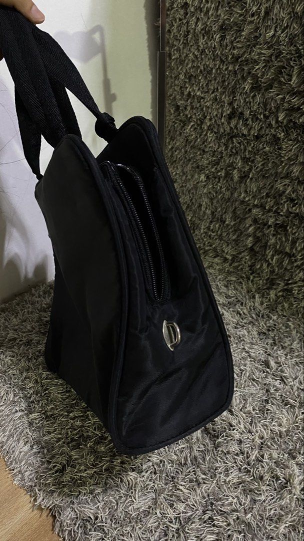 Prada handbag (Category: Luxury Bags & Wallets) located in Tagum. Submitted by amarasluxbag (Listing ID 1462741588, Image 2). Description: Supertibay May kunting rubs No faded Nylon material .
