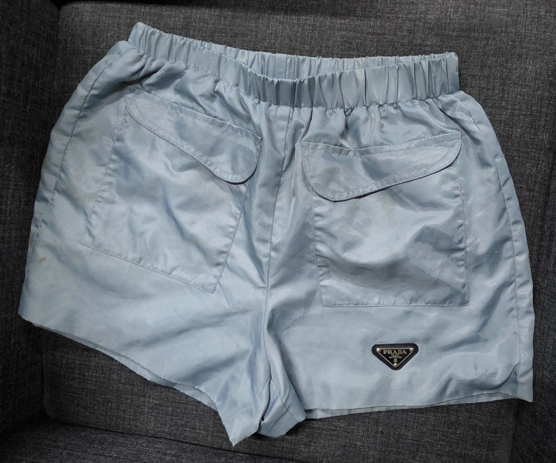 Prada Light Blue Nylon Shorts Size S (Category: Shorts) located in General Trias. Submitted by roselle2230 (Listing ID 1462822772, Image 2). Description: - Authentic Prada shorts in light blue - Made from durable nylon - Size S - Comfortable elastic waistband with drawstring - Two back pockets and one front pocket - Iconic Prada logo triangle featured on front and back.