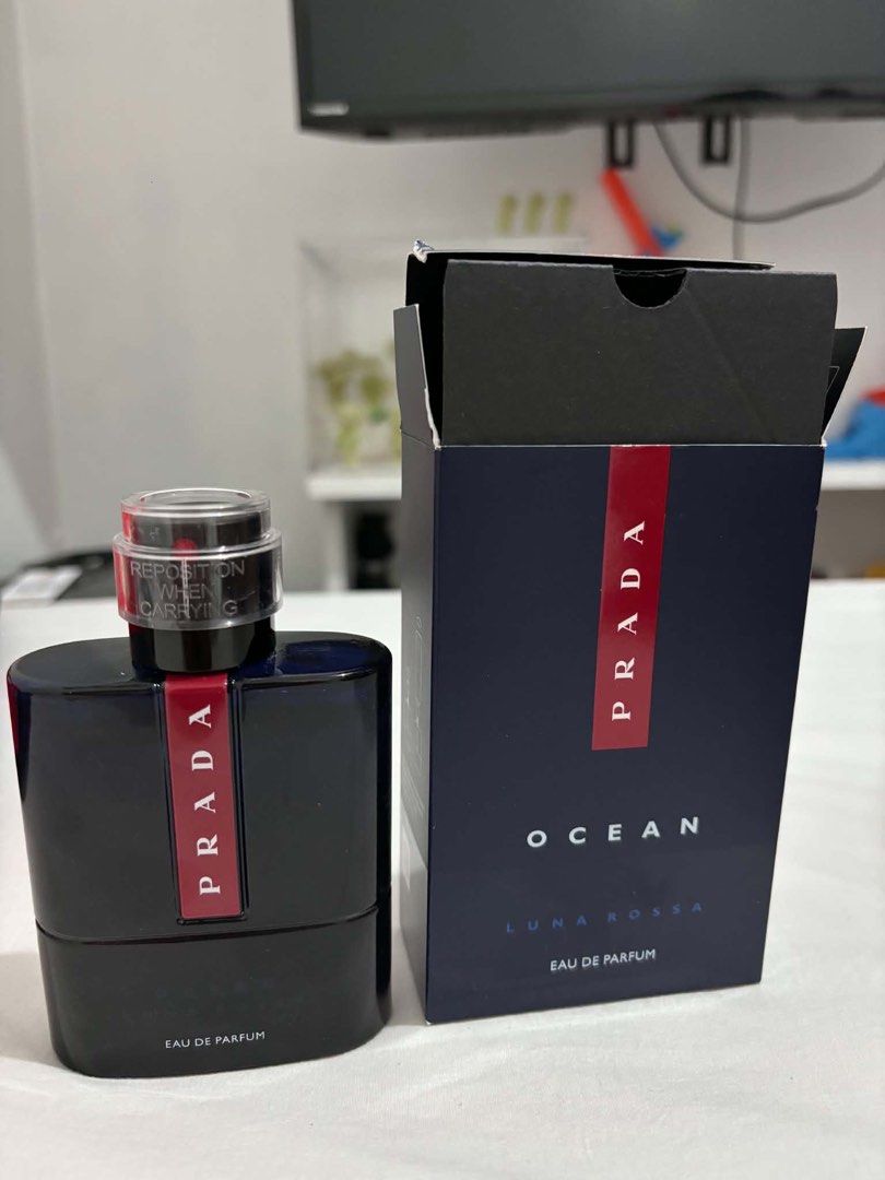 Prada Luna Rossa Ocean Eau de Parfum for Men (Category: Fragrance & Deodorants) located in Quezon City. Submitted by makeitkmn (Listing ID 1462879803, Image 1). Description: - Prada Luna Rossa Ocean Eau de Parfum - Features a dark blue bottle with a distinctive red stripe - Comes with its original packaging - Versatile scent suitable for daily use and special events - A highly sought-after fragrance.
