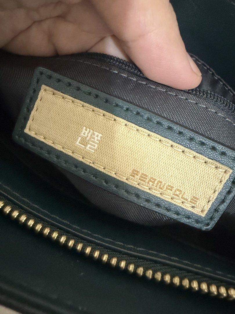 Preloved Bean Pole sling bag (Category: Cross-body Bags) located in Taytay. Submitted by welloveditems (Listing ID 1462846828, Image 3). Description: - Preloved Bean Pole sling bag - Deep green color - Stylish and versatile design - Good preloved condition.