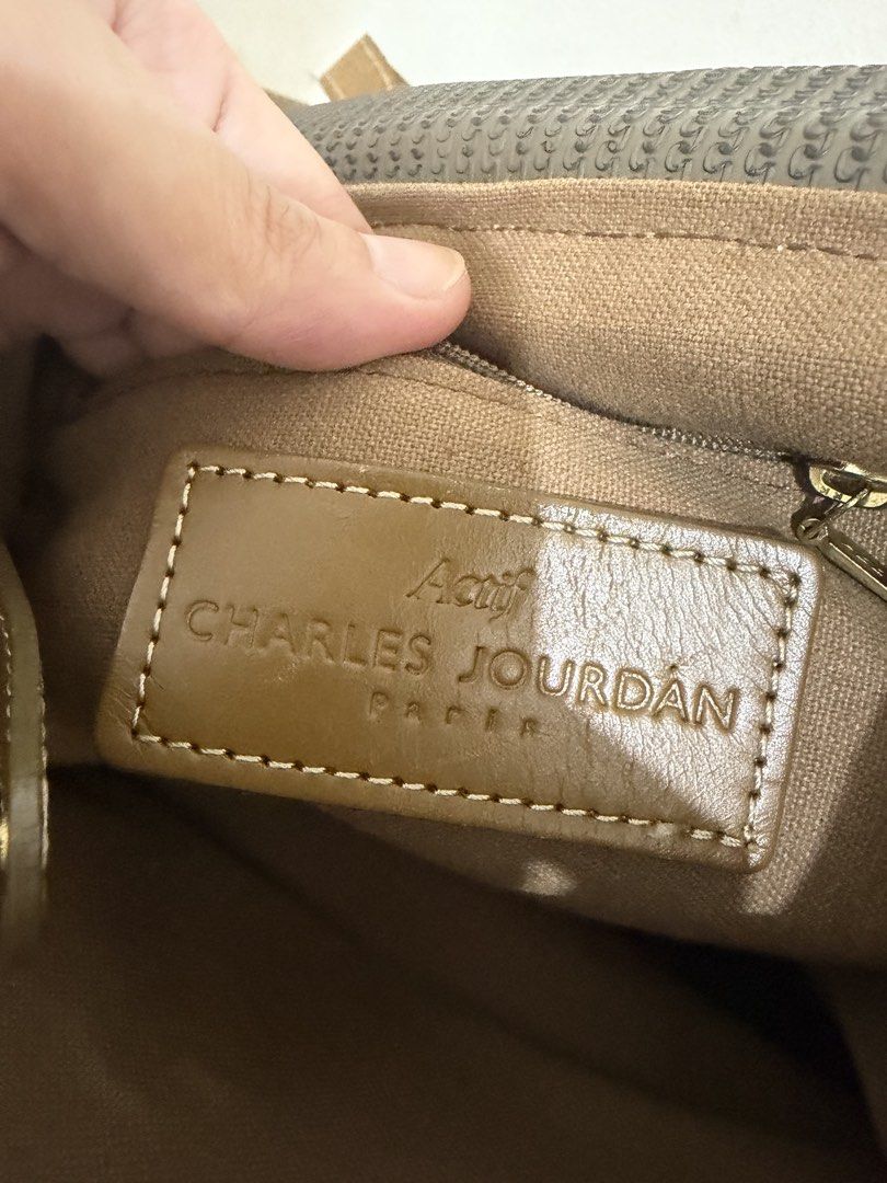 Preloved Charles Jourdan bagpack (Category: Backpacks) located in Taytay. Submitted by welloveditems (Listing ID 1462852318, Image 3). Description: - decluterring my personal bag pack still in good condition - Charles Jourdan bagpack - Durable material - Spacious interior - Classic and versatile design - pm for more details Always manage your expectation when buying preloved items Loc Taytay Rizal .
