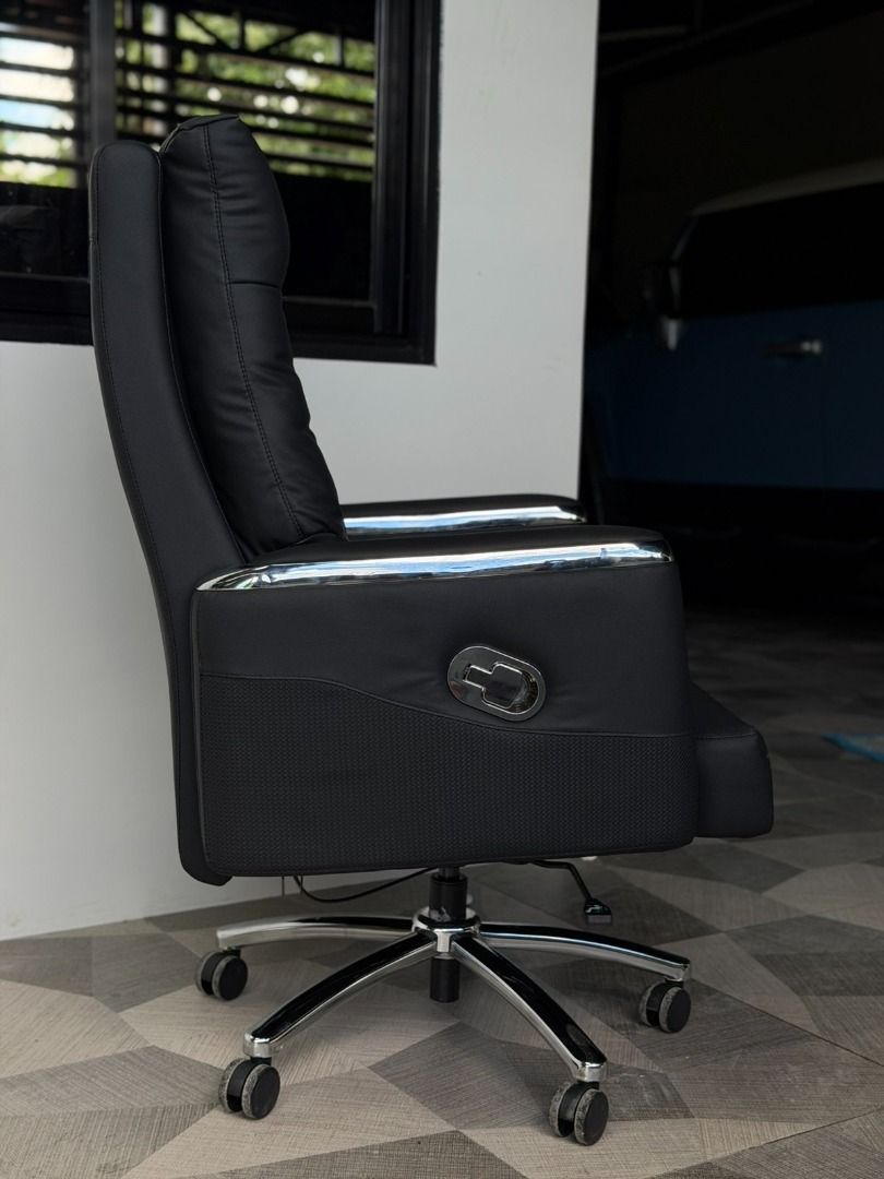 Premium Office Chair (Category: Chairs) located in Santiago. Submitted by gefftullao (Listing ID 1462839785, Image 2). Description: - Comfortable executive office chair - Padded seat and backrest for support - Stylish chrome accents on armrests and base - Swivel base with wheels for easy mobility - Adjustable height and recline - Ideal for home office or workspace Premium Office Chair A2317 PU-Leather | Black / Grey BRAND NEW! Recline Tilt Price: