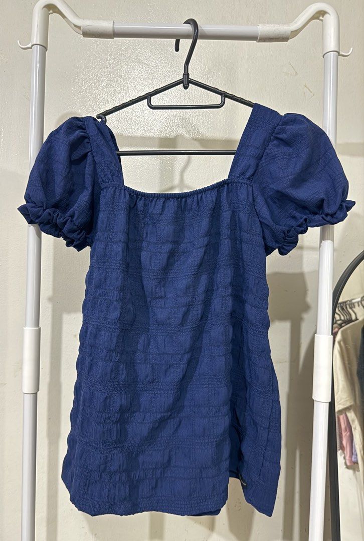 Puff Sleeve Square Neck Top Navy Blue Size S (Category: Blouses) located in Manila. Submitted by lovedbyan (Listing ID 1462879014, Image 1). Description: - Navy blue puff sleeve top - Square neckline with smocked detailing - Textured fabric - Short sleeves with ruffled cuffs - Cute and comfy for casual wear - Easy to pair with jeans or skirts.
