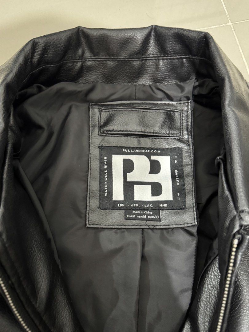 Pull & Bear Black Washed Effect Leather Jacket (Category: Coats, Jackets and Outerwear) located in Mandaluyong City. Submitted by thewanderingmangyan (Listing ID 1462782378, Image 3). Description: - Brand: Pull & Bear - Color: Black - Style: Classic collar, zip-up front - Features: Two front pockets - Size: Medium (M) - Styling: Perfect for layering or wearing alone, pairs well with jeans and trousers..