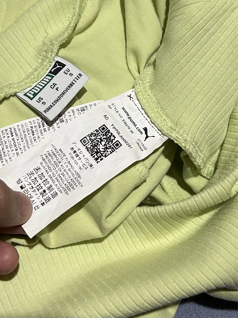 Puma High Waisted Ribbed Shorts (Category: Shorts) located in Miagao. Submitted by juliusokra (Listing ID 1462853963, Image 3). Description: - Brand: Puma - Color: Bright Lime Green - Style: High-waisted shorts - Features: Ribbed waistband, comfortable and stretchy material - Ideal for: Workouts or casual wear - Fit: Waistline fits 24"-28" - Length: 14.5 inches.