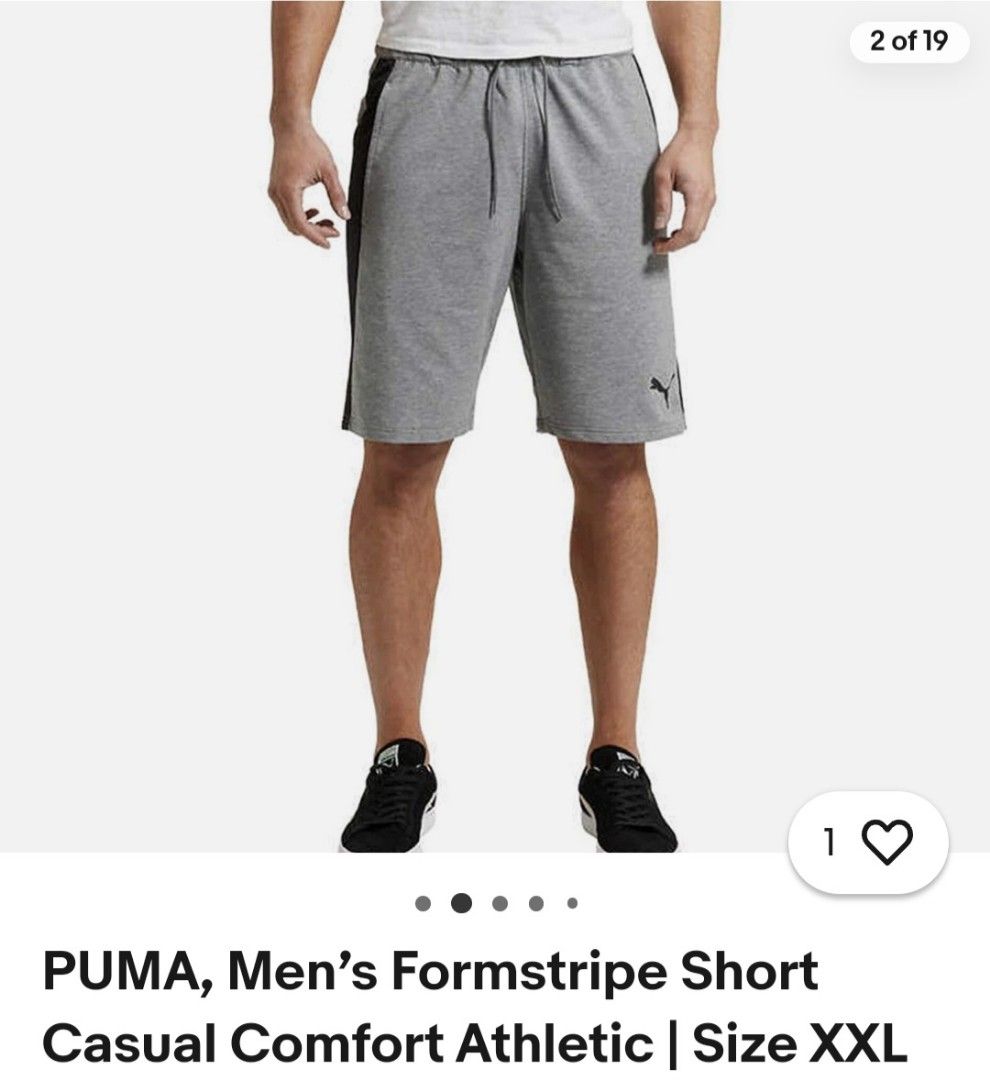 Puma Men's Grey Athletic Shorts XL (Category: Shorts) located in Plaridel. Submitted by igieperez147282 (Listing ID 1462843795, Image 3). Description: - Grey Puma shorts - Black side stripes - Elastic waistband with drawstring - Size XL (fits waist 36-42 inches) - Length: 20 inches - Made in Cambodia - Ideal for casual wear or sports.