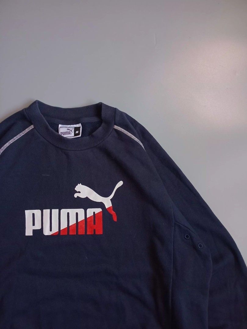puma reverse stitch sweater (Category: Coats, Jackets and Outerwear) located in San Isidro. Submitted by lagloots (Listing ID 1462884420, Image 2). Description: puma sweater contrast stitch gandaa carpet type yung red part sa logo not faded, sa cam lang fits up to semi large DIMES (IN INCHES) LENGTH: 27 / WIDTH: 23 CONDITION: 9/10 [] COLOR RATE: 9/10 ISSUE: none.