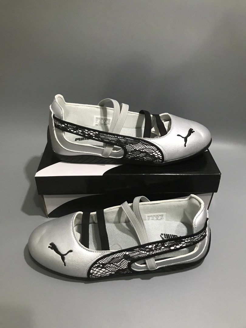 Puma Silver Ballet Flats with Straps (Category: Flats & Sandals) located in Rizal. Submitted by sakre (Listing ID 1462829373, Image 2). Description: - Silver Puma ballet flats - Features elastic straps across the top - One pair includes a black lace detail on the side - Comes with original Puma boxes - Ideal for casual wear.